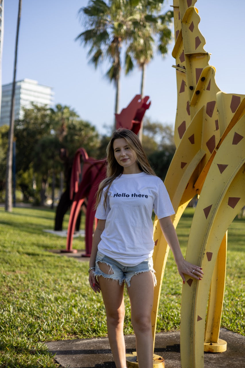 Alexandria LaChapelle models the Hello there Greet Tee Shirt for Happy interactions in black