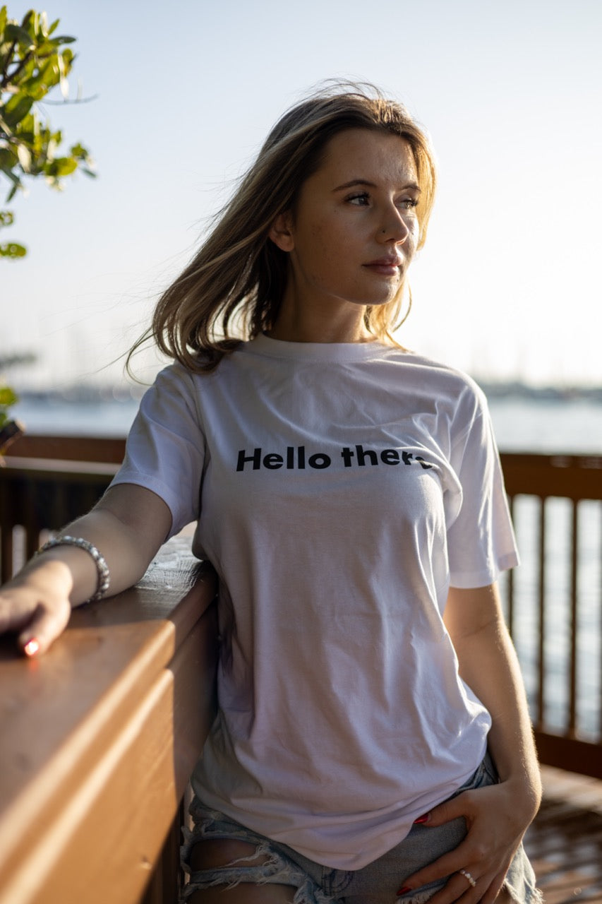 Alexandria LaChapelle models the Hello there Greet Tee Shirt for Happy interactions in black