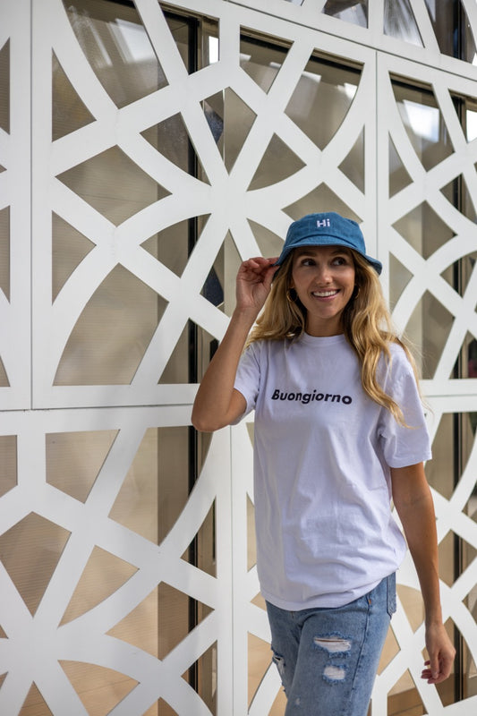 Alia Buoniello models the Hi Buongiorno Happy interactions Greet Tee Shirt in White at the Miami Design District