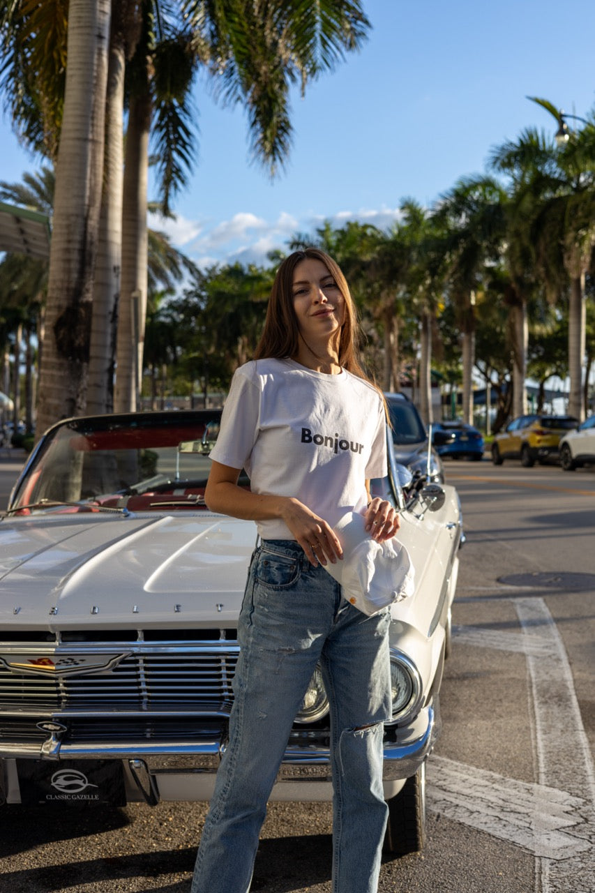 Hi Bonjour French Greeting t shirt in white modeled by Anastasia Ponomar in Edgewater, Miami Florida