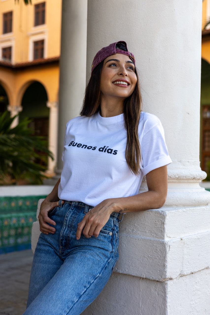 Hi Buenos Dias Spanish Good day Greeting T shirt in white, modeled by Rosa Abi at the Biltmore in Coral Gables Florida
