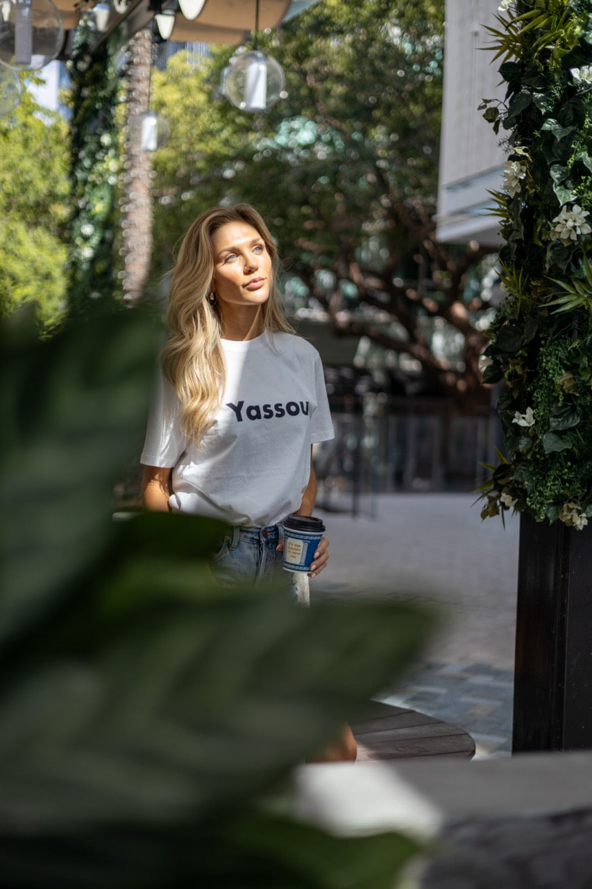 Hi Yassou Greek Greeting T shirt modeled by Victoria Peyton photo by Johnny Michael in Coconut Grove, Miami, Florida
