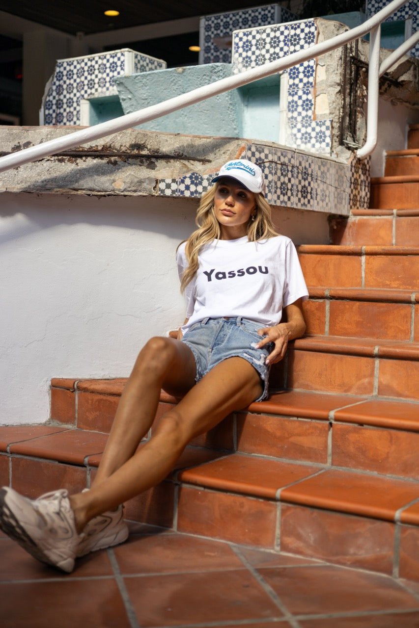 Hi Yassou Greek Greeting T shirt modeled by Victoria Peyton photo by Johnny Michael in Coconut Grove, Miami, Florida
