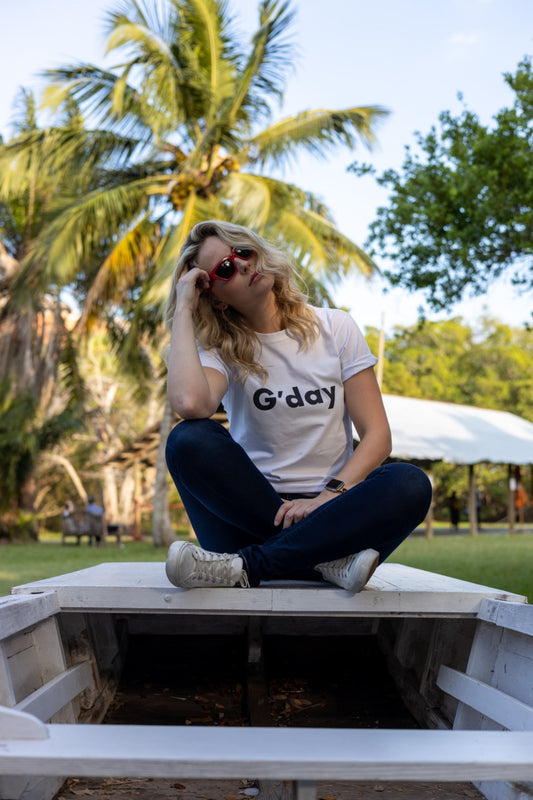 Hi G'day Australian Greeting in white modeled by Jen Halvorson at The Historic Barnacle in Coconut Grove, Miami, Florida