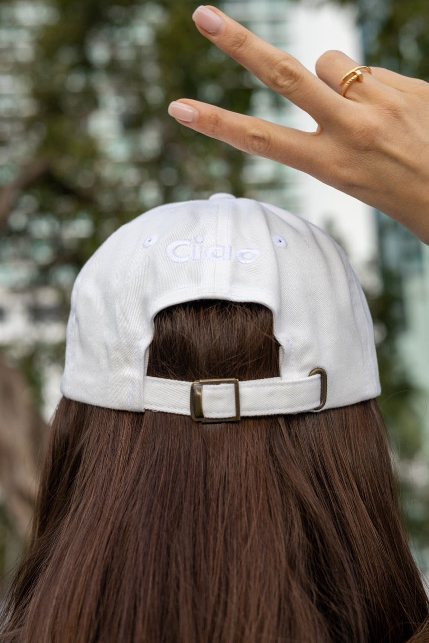 Hi Ciao hat in white modeled by Anastasia Ponomar photo by Johnny Michael 