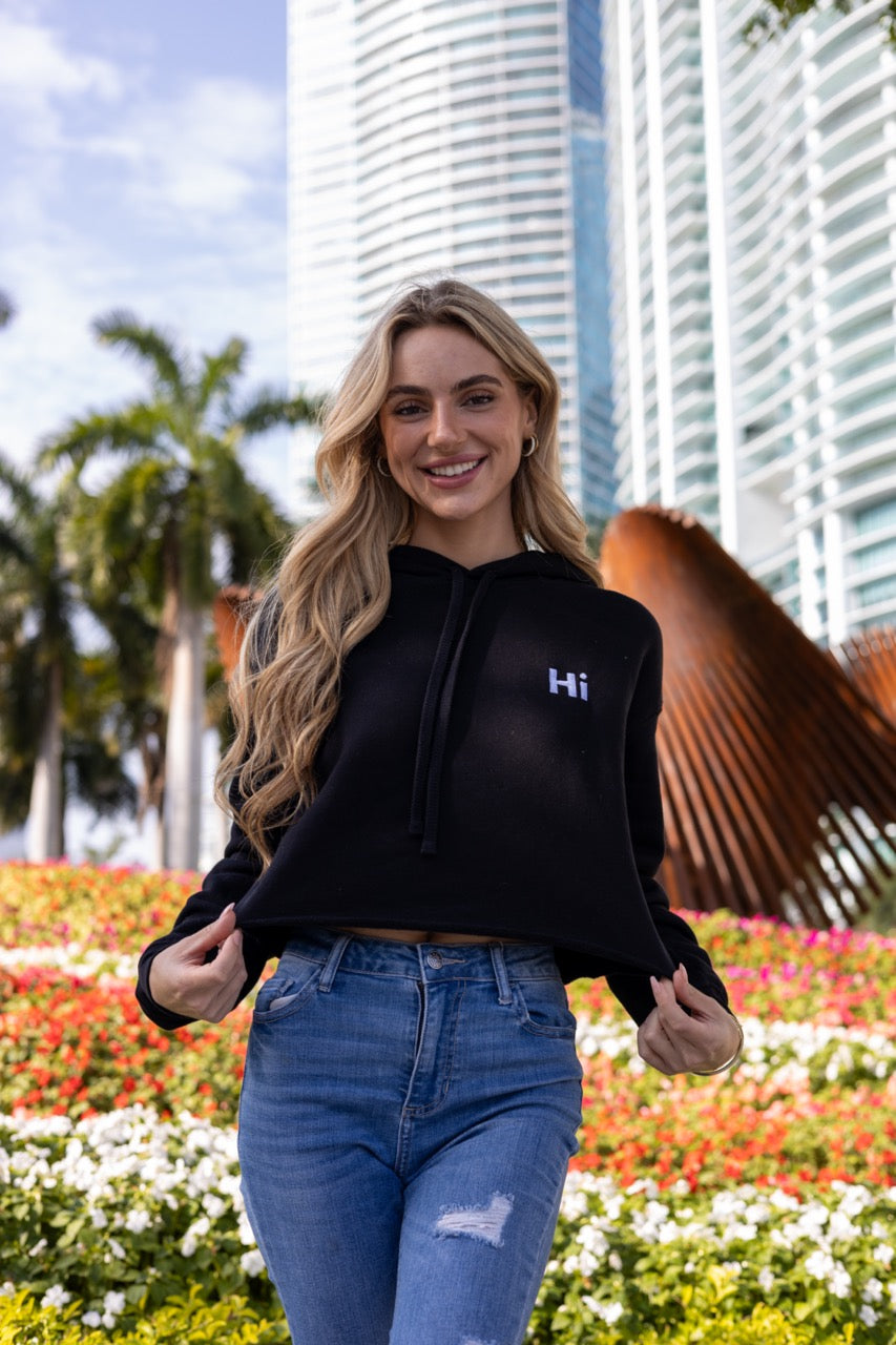 Hi 👋 Embroidered Cropped Hoodie in black modeled by Kara Gault photo by Johnny Michael