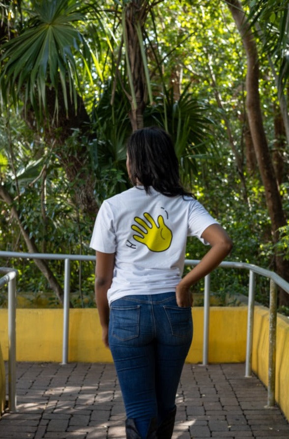 Hi Hey y'all Friendly Southern Greeting T shirt in white, modeled by Alyssa Ferguson at the Barnacle in Coconut Grove, Miami Florida