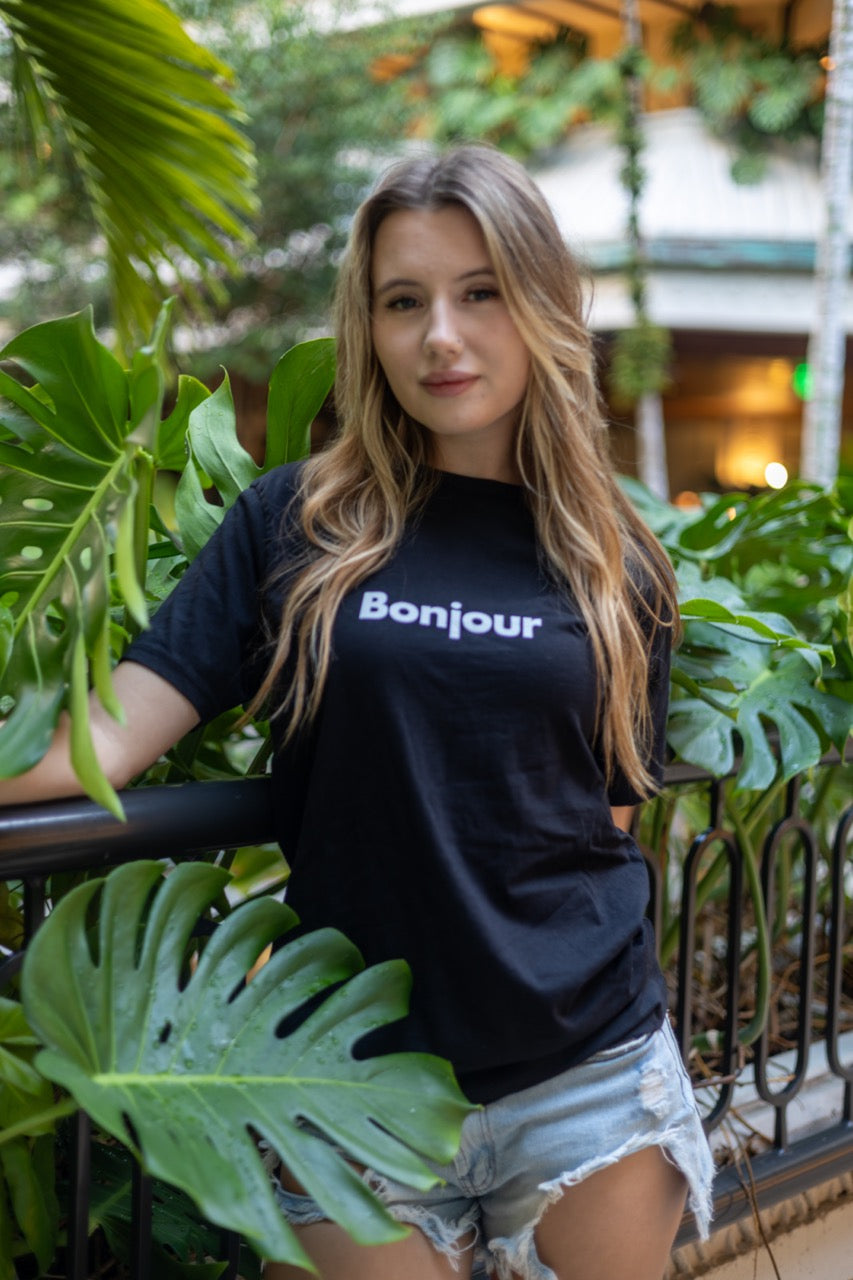 Alexandria LaChapelle models the Bonjour T Shirt for Happy interactions in black