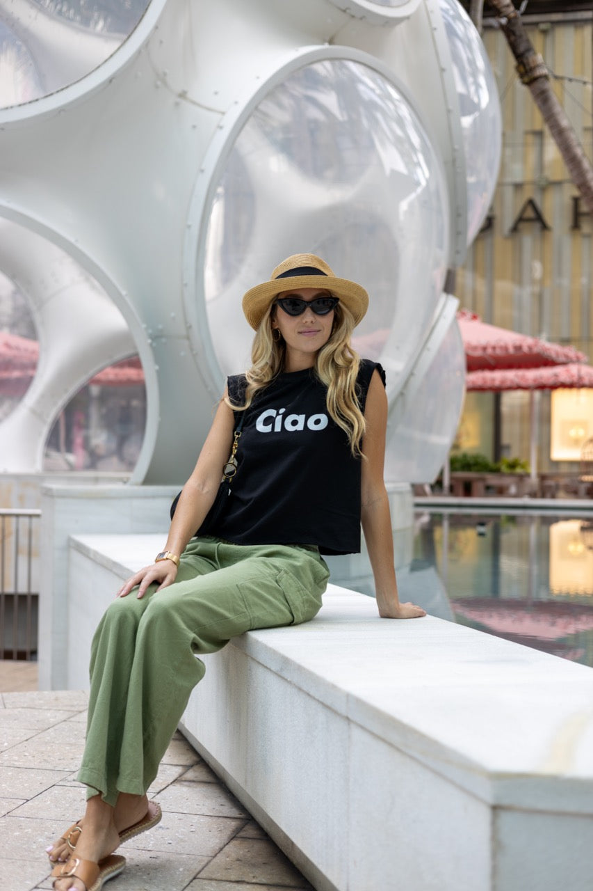 Alia Buoniello models the Hi Ciao Italian Greet Tee by Happy interactions in Black at the Miami Design District
