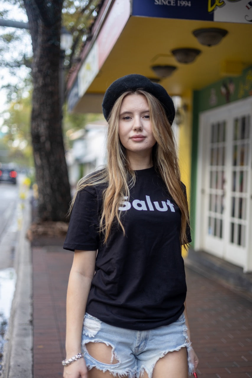 Alexandria LaChapelle models the Salut French Greet Tee Shirt for Happy interactions in black
