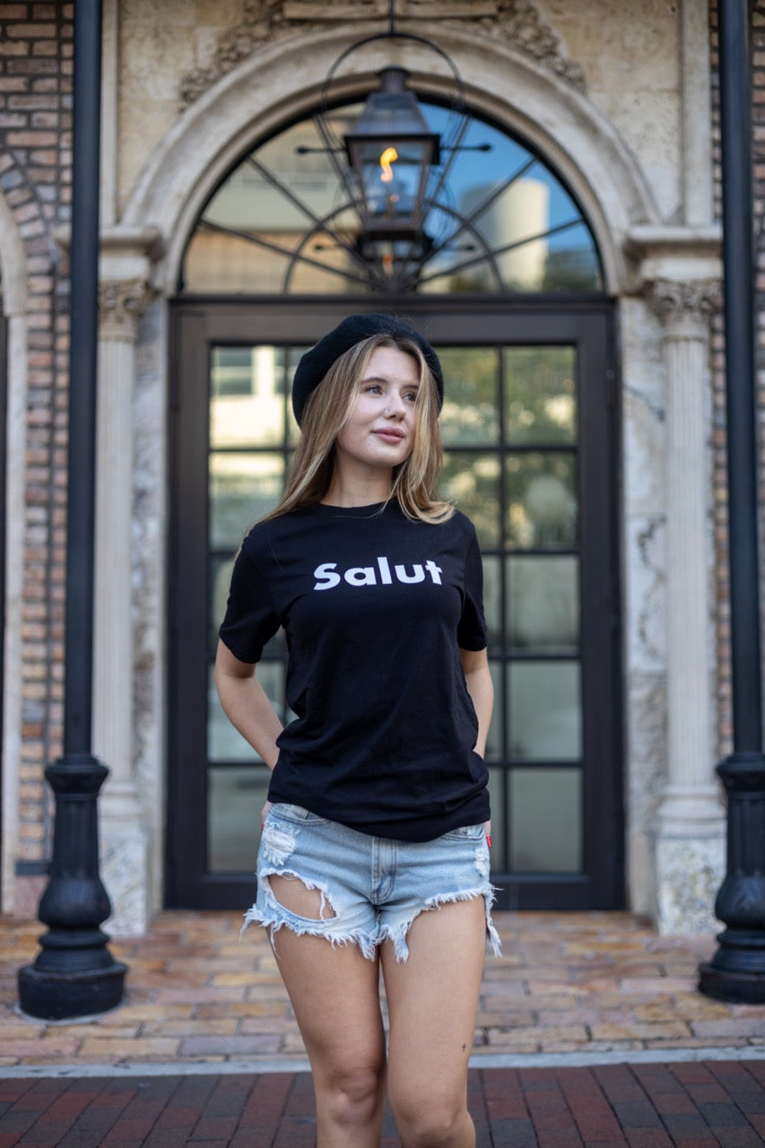 Alexandria LaChapelle models the Salut French Greet Tee Shirt for Happy interactions in black