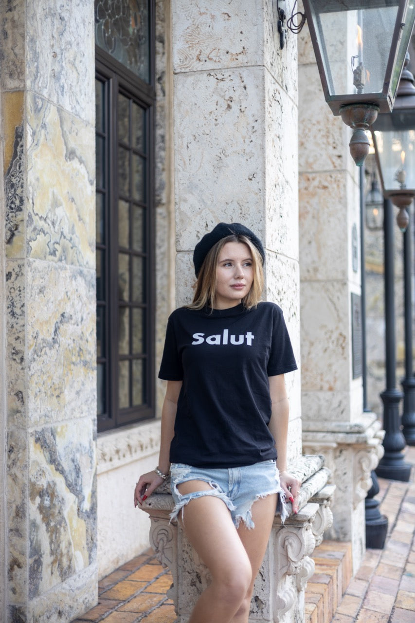 Alexandria LaChapelle models the Salut French Greet Tee Shirt for Happy interactions in black