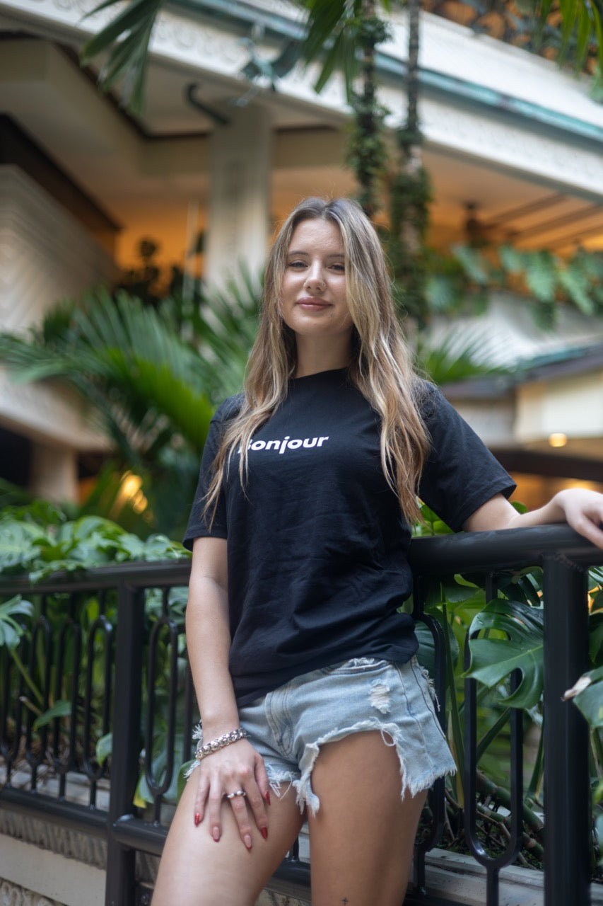 Alexandria LaChapelle models the Bonjour T Shirt for Happy interactions in black