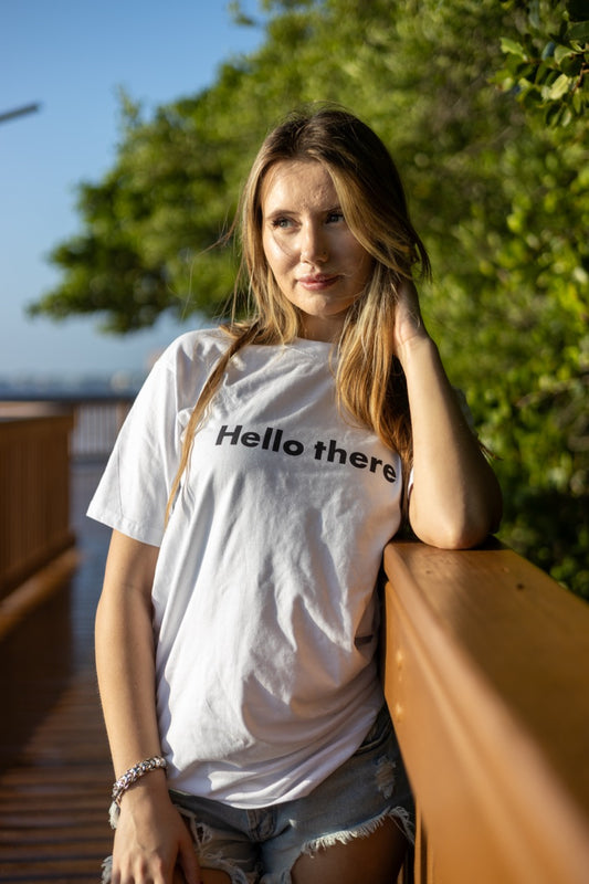 Alexandria LaChapelle models the Hello there Greet Tee Shirt for Happy interactions in black