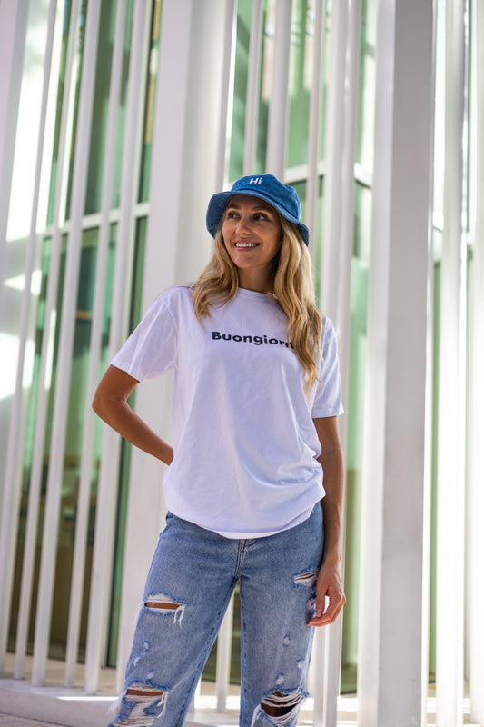 Alia Buoniello models the Hi Buongiorno Happy interactions Greet Tee Shirt in White at the Miami Design District