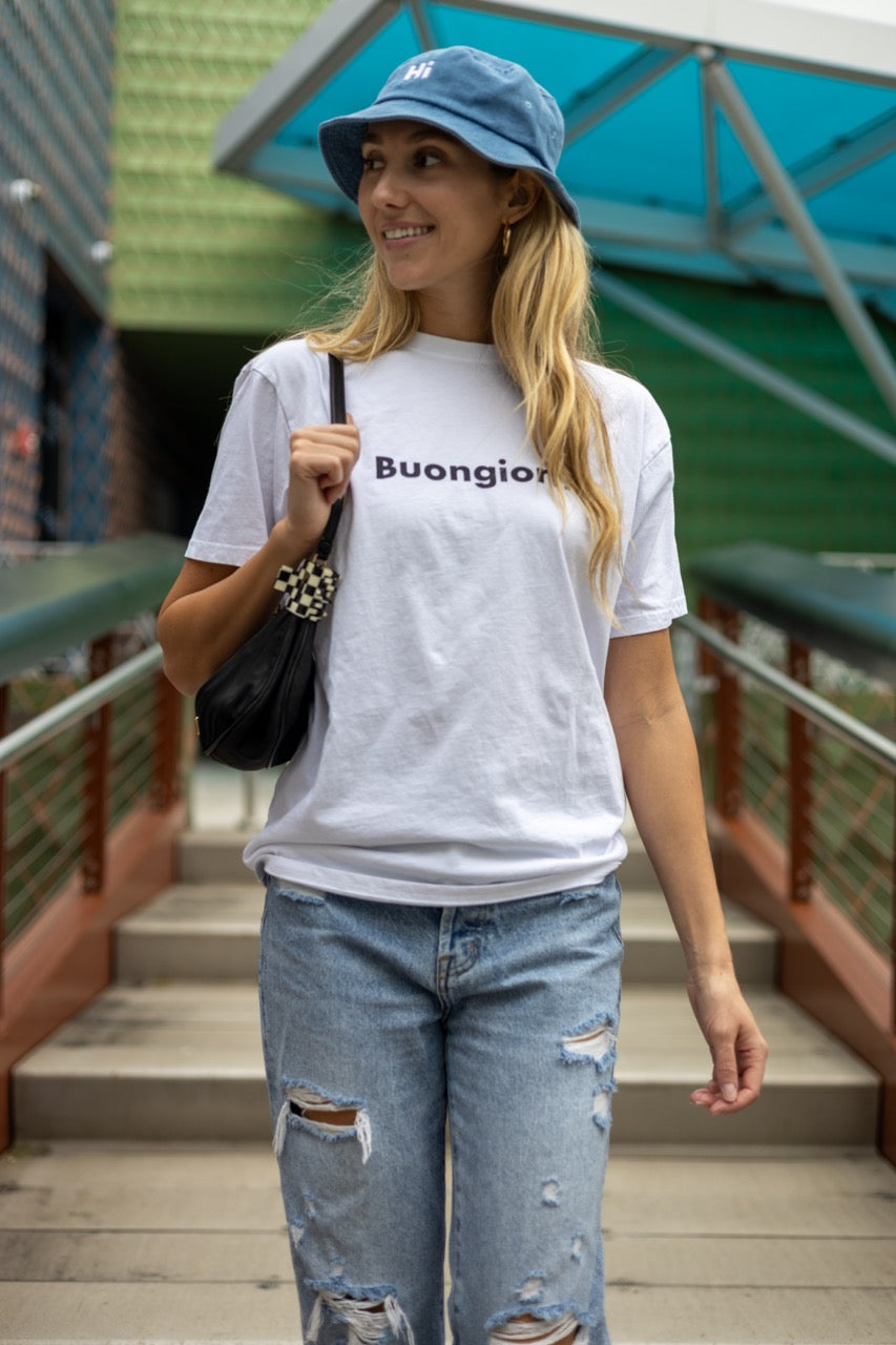 Alia Buoniello models the Hi Buongiorno Happy interactions Greet Tee Shirt in White at the Miami Design District