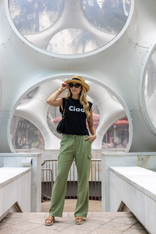 Alia Buoniello models the Hi Ciao Italian Greet Tee by Happy interactions in Black at the Miami Design District