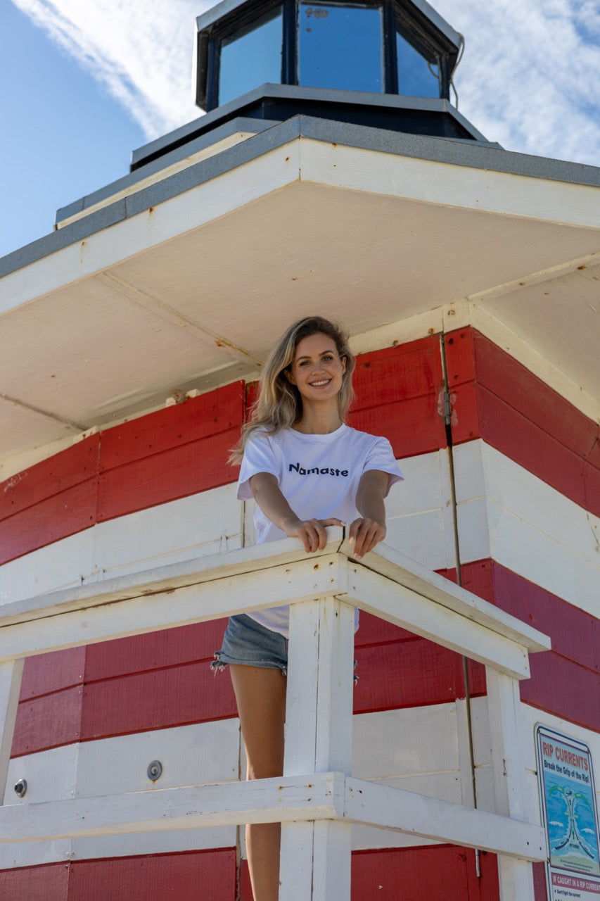 Hi Namaste Indian Greeting T Shirt in white, modeled by Claire photographed by Johnny Michael at Miami Beach South Pointe Park in Miami, Florida