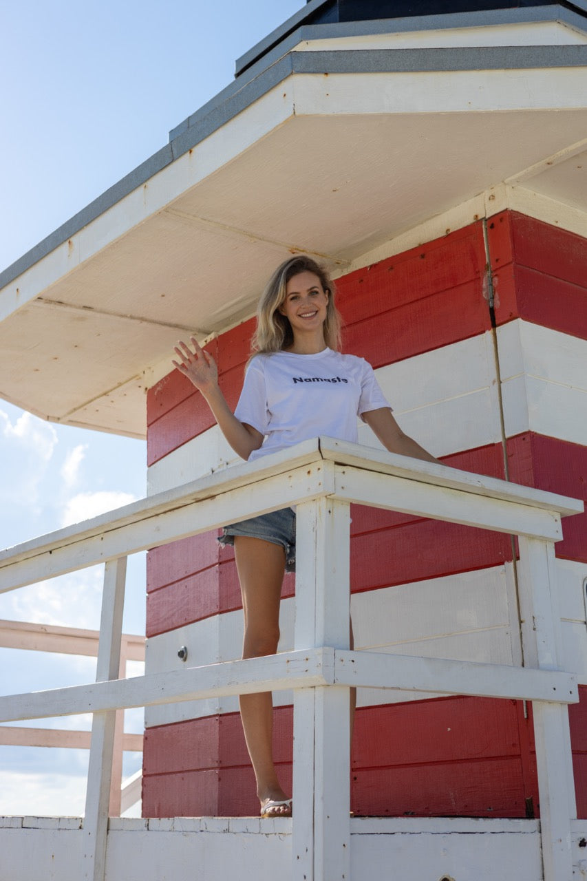 Hi Namaste Indian Greeting T Shirt in white, modeled by Claire photographed by Johnny Michael at Miami Beach South Pointe Park in Miami, Florida