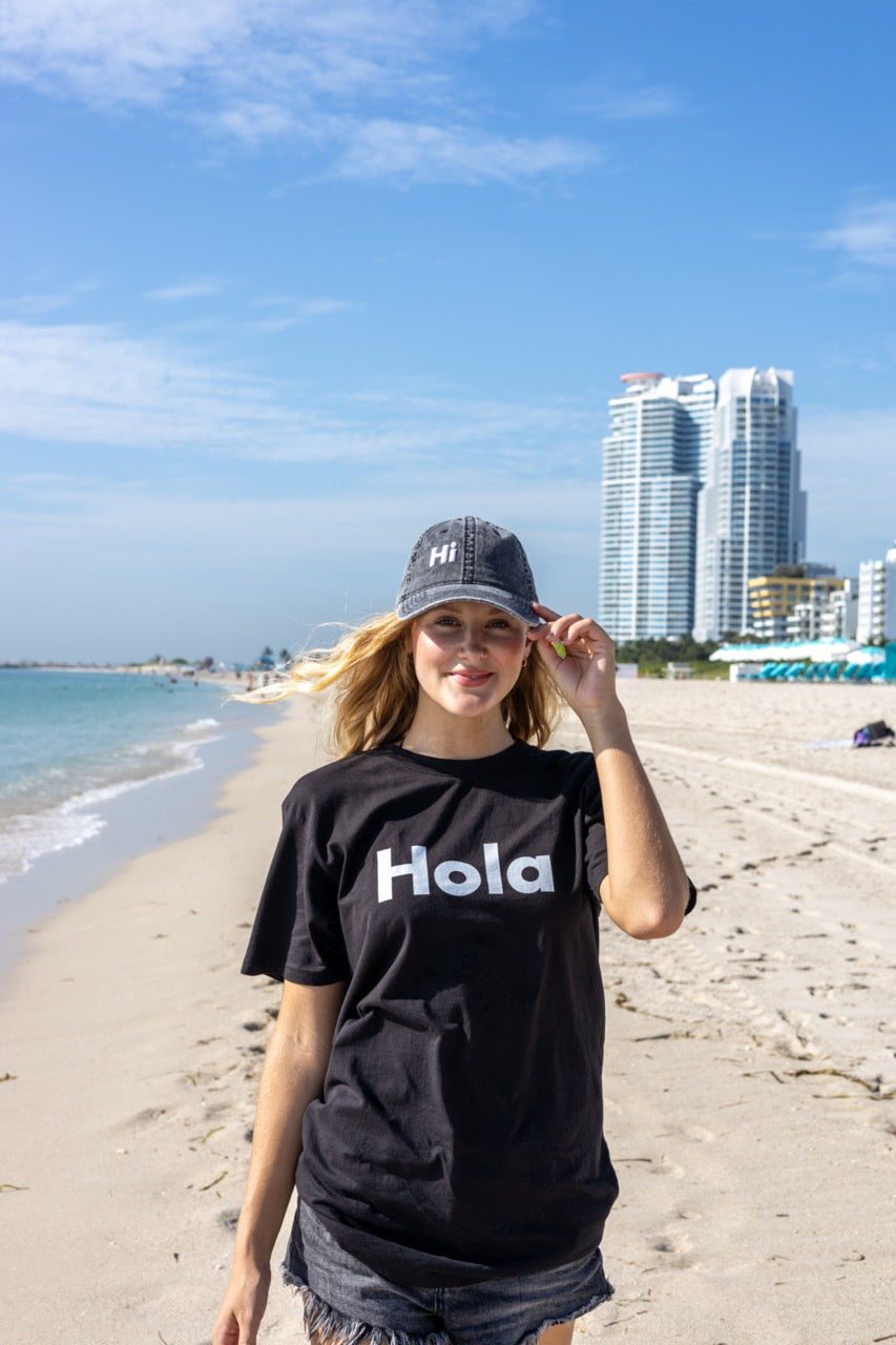 Hola shirt and Namaste Vintage Hat by Hi Happy interactions modeled by Elli Scarborough and photographed by Johnny Michael