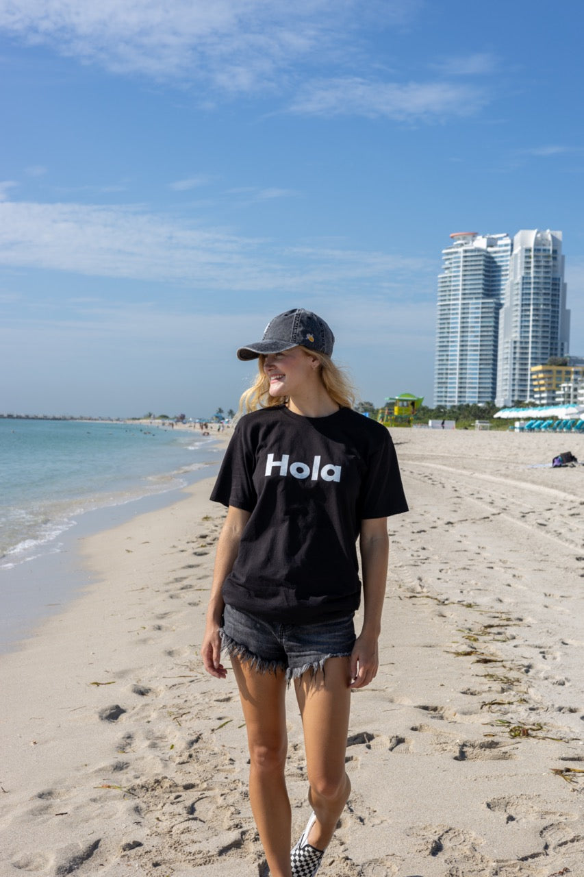 Hola shirt and Namaste Vintage Hat by Hi Happy interactions modeled by Elli Scarborough and photographed by Johnny Michael