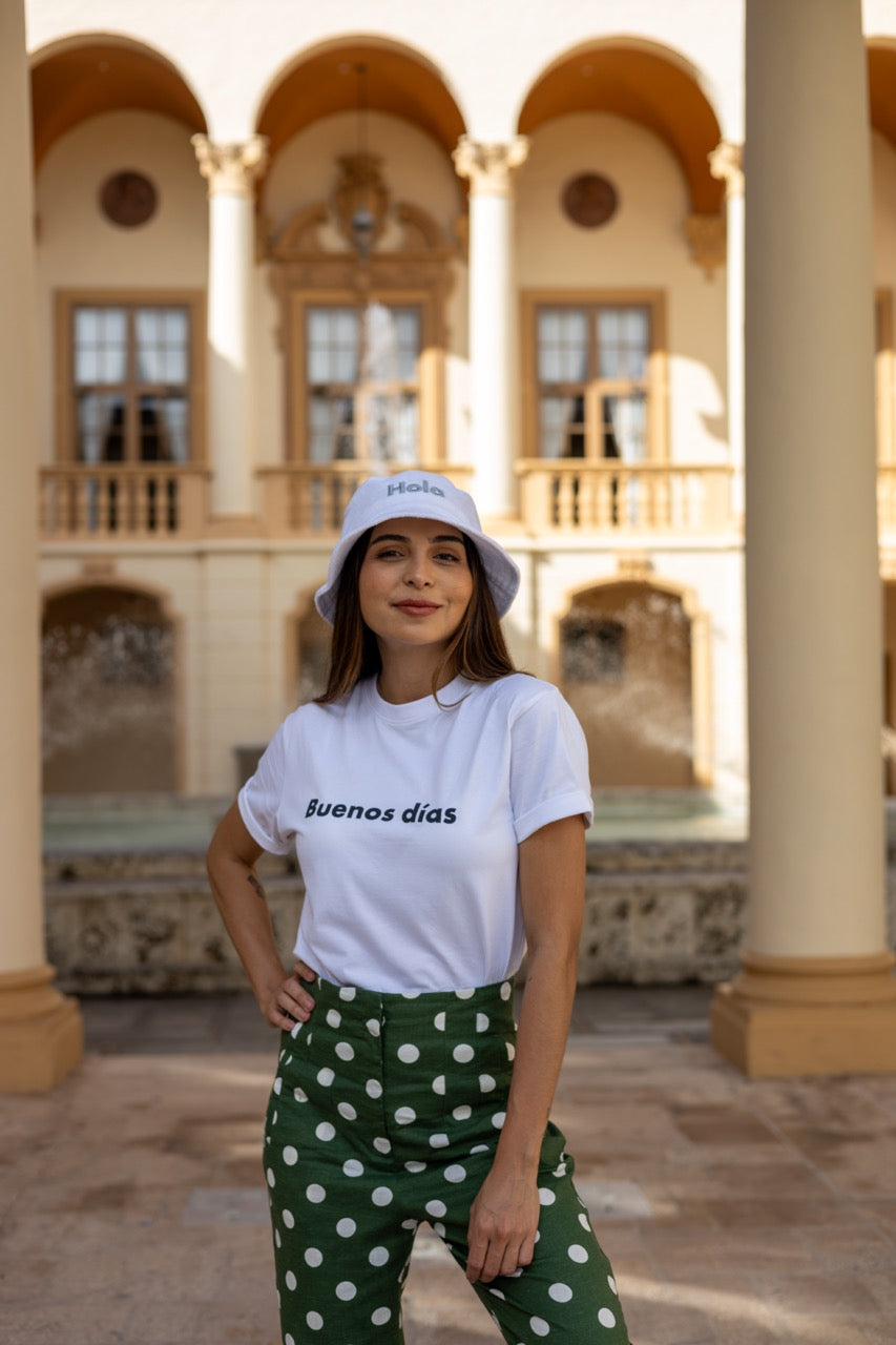 Rosa wears the Hi Hola Fuzzy Bucket Hat by Happy interactions at The Biltmore