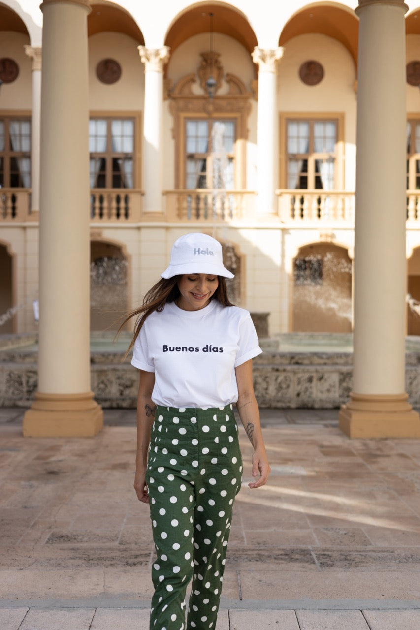 Rosa wears the Hi Hola Fuzzy Bucket Hat by Happy interactions at The Biltmore