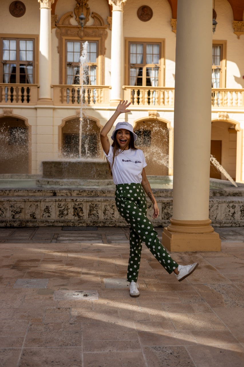 Rosa wears the Hi Hola Fuzzy Bucket Hat by Happy interactions at The Biltmore