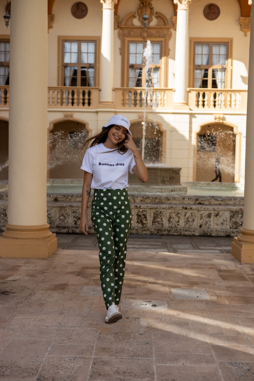 Rosa wears the Hi Hola Fuzzy Bucket Hat by Happy interactions at The Biltmore