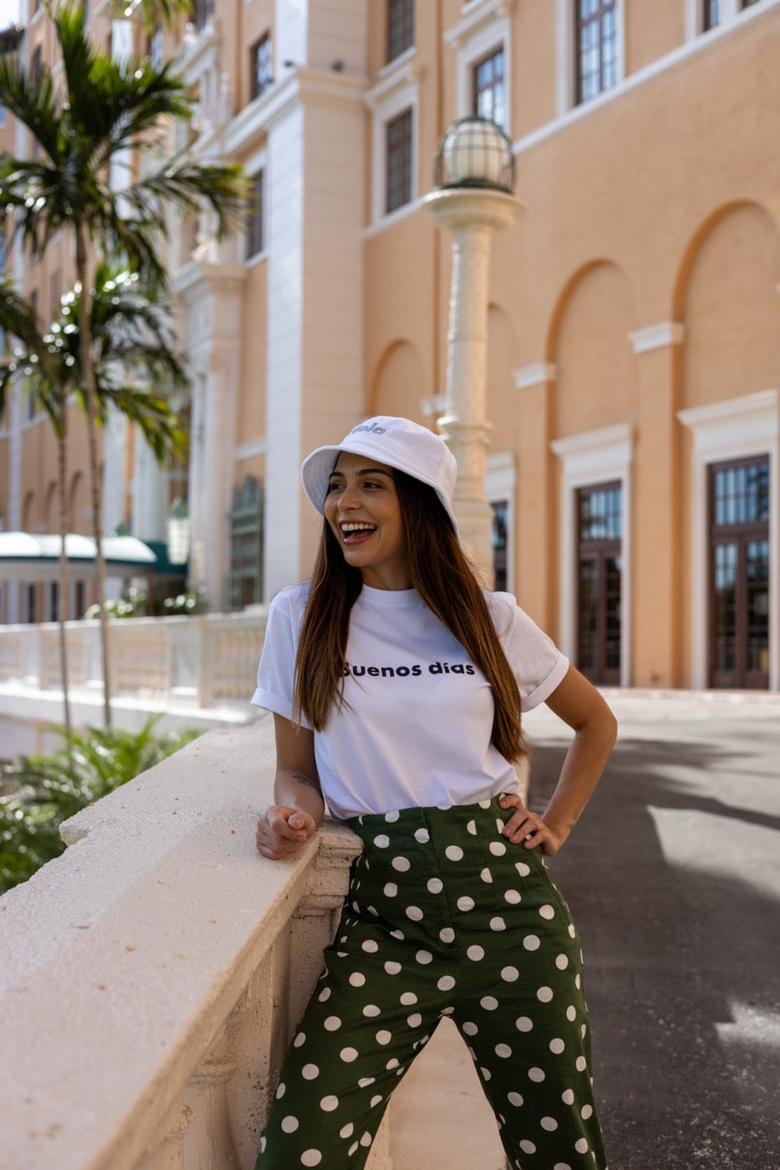 Rosa wears the Hi Hola Fuzzy Bucket Hat by Happy interactions at The Biltmore