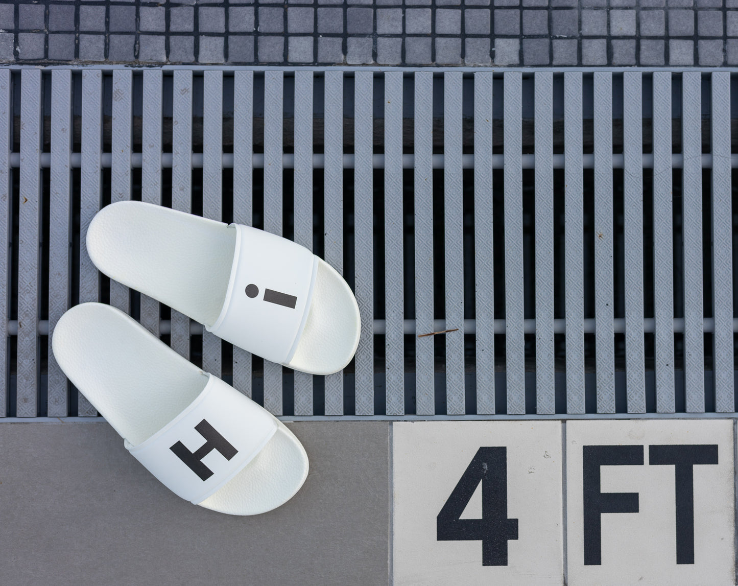 Hi H and i Flip Flop Slide Men's Sandals for Happy interactions, Hi on right flop, i on the left flop, slides that say Hi by Johnny Michael at HiJohnny.com