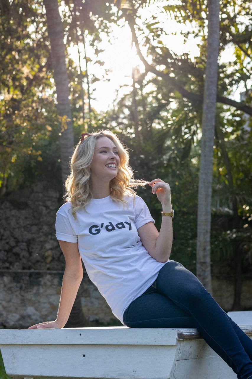 Hi G'day Australian Greeting in white modeled by Jen Halvorson at The Historic Barnacle in Coconut Grove, Miami, Florida