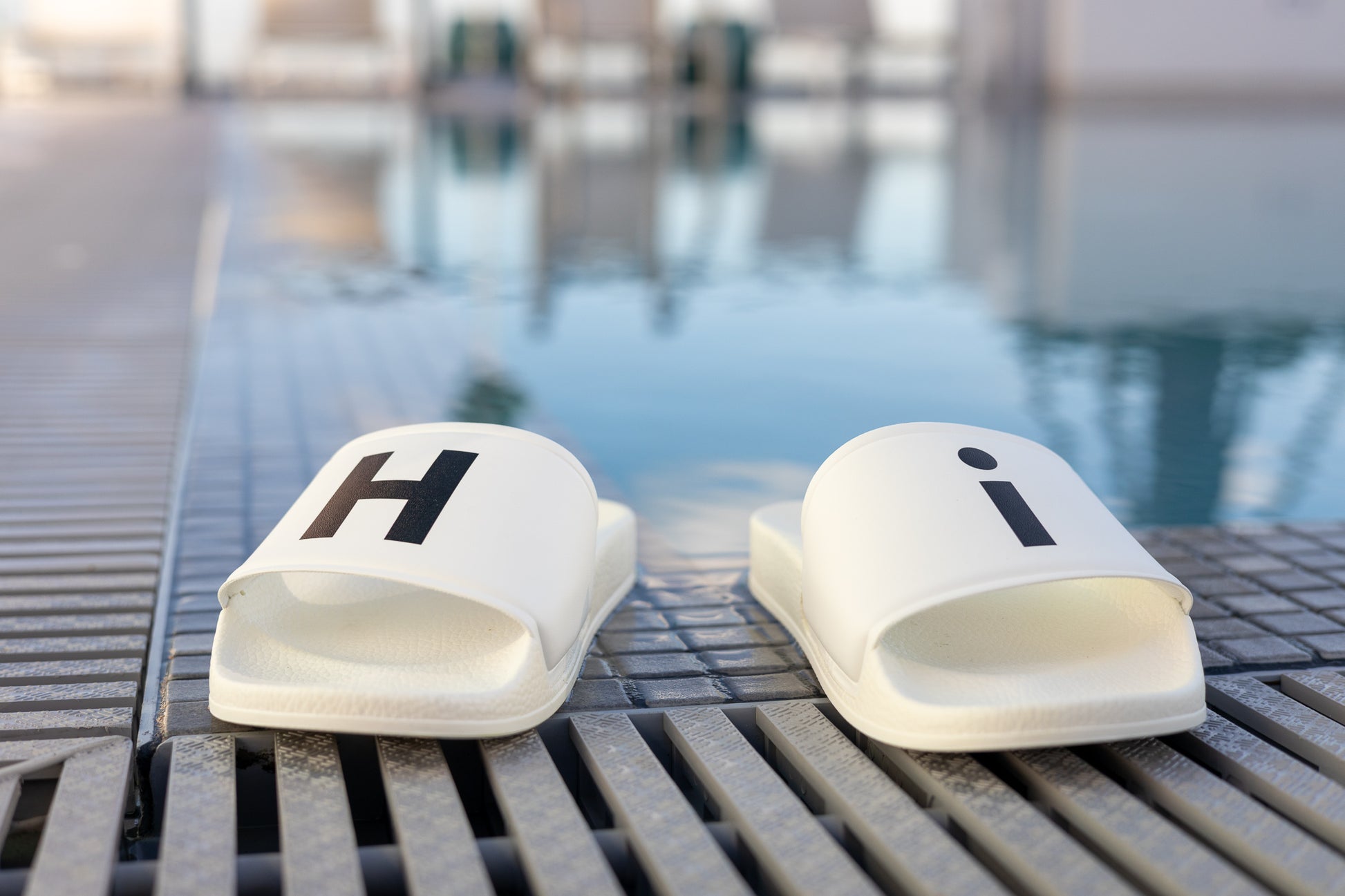 Hi H and i Flip Flop Slide Womens Sandals for Happy interactions, Hi on right flop, i on the left flop, slides that say Hi