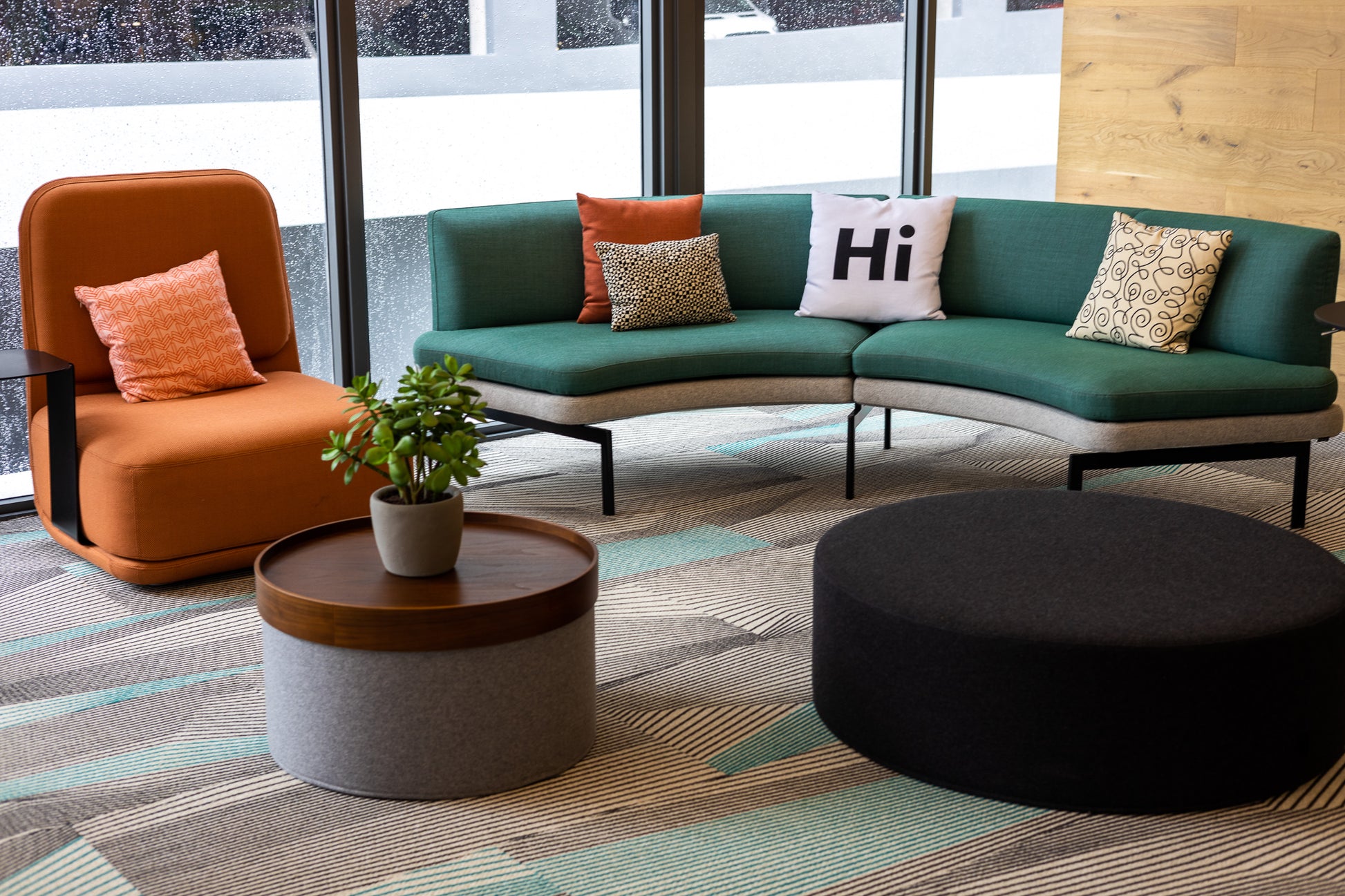 Hi Pillow by Hi Johnny in white in a coworking space lounge area